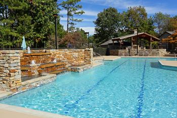 Resort-style swimming pool with sundeck